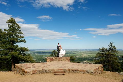 The best wedding photographer for the Sunrise Amphitheater on Flagstaff Mountain in Boulder, CO